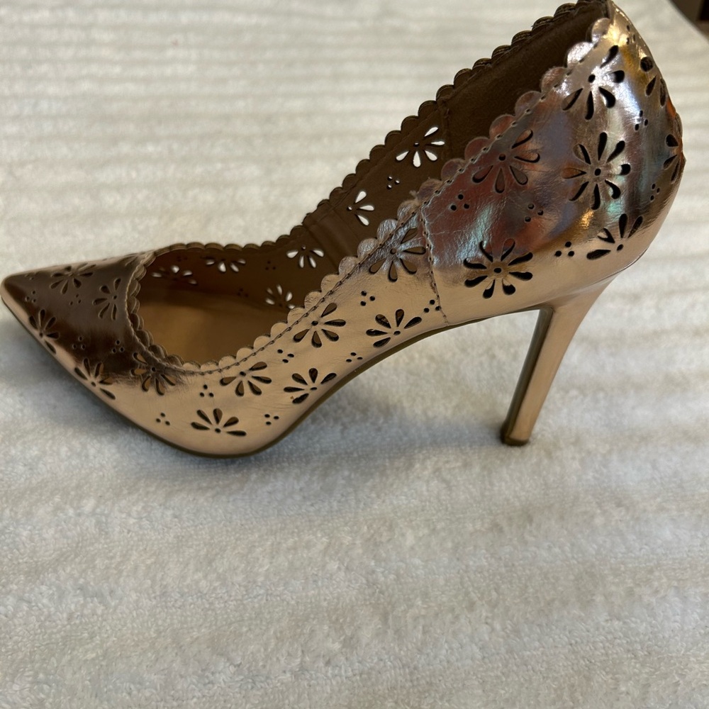 Lauren Conrad rose gold heels.
